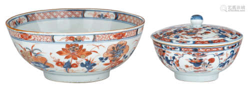 A Chinese Imari bowl, decorated with lotus flowers; added: a ditto floral covered bowl, the roundels decorated with antiquities, pomegranates, Buddha's hands and lingzhi, the inside with a flower in underglaze blue, 18thC, H 9,5 - 10,5 - ø 15 - 23 cm