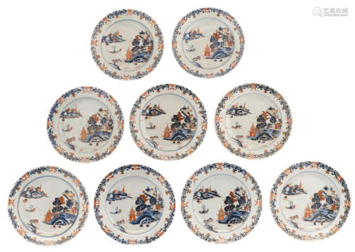 Nine Chinese Imari export porcelain dishes, decorated with a fisherman in a village landscape, 18thC, ø 22 - 22,5 cm
