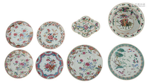 A lot of various Chinese famille rose floral decorated dishes and plates, a ditto footed plate and a bowl; added: a ditto Canton plate, H 5,5 - 9,5 - ø 22,5 - 38 cm