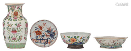 A Chinese famille rose bowl, decorated with lotus branches in a garden setting; added: a Chinese Imari dish; extra added: a Chinese famille rose vase with the Eight Buddhist symbols and a ditto footed lobed flower plate, H 8,5 - 35,5 - ø 22 - 27 cm   