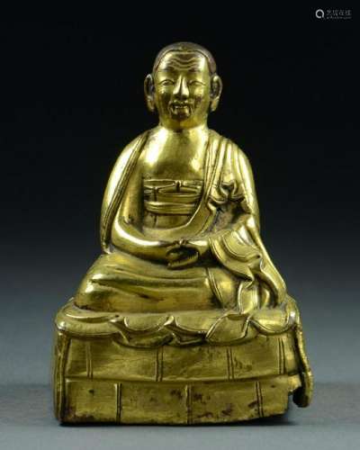 Small Tibetan Gilt Bronze Seated Figure of a Lama