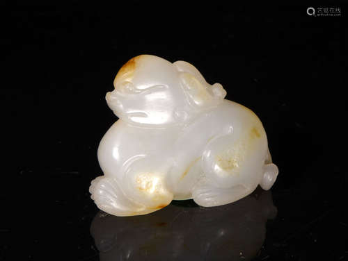 A  QING  DYNASTY   WHITE  JADE   AUSPICIOUS    BEAST