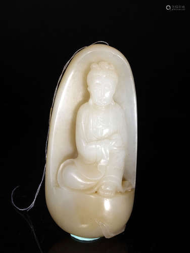 A  QING  DYNASTY   WHITE  JADE   HANDPIECE  WITH  SUGAR  GUAN  YIN