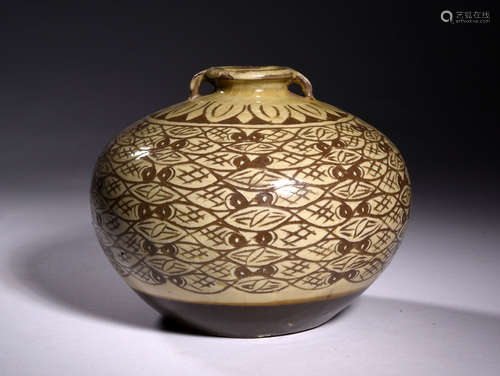 A  MING  DYNASTYWHITE  GLAZE  CARVED  PISCES  JAR