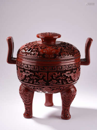 A  TAOTIE  PATTERN  DOUBLE  EAR  THREE-LEGGED   AROMATHERAPY  CYLINDER  IN  QING  DYNASTY