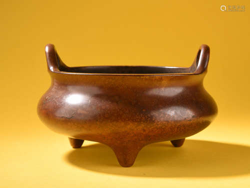 A   QING  DYNASTY  COPPER    BRIDGE  EAR  TRIPOD  FURNACE