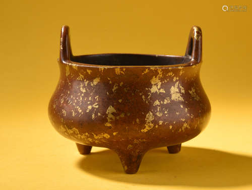 A   QING  DYNASTY  COPPER   AND  GOLD   BRIDGE  EAR  TRIPOD  FURNACE