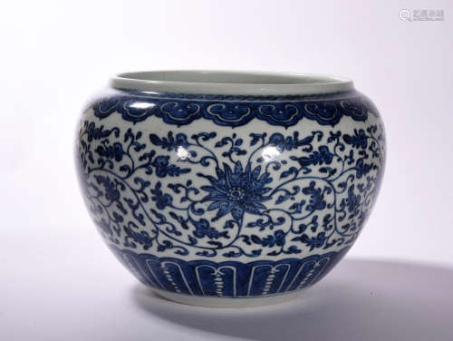 A  BLUE  AND  WHITE  LOTUS  PATTERN  CYLINDER  WITH  BRANCH  WRAPPING  IN  QIANLONG  PERIOD