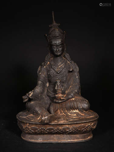 A  QING  DYNASTY  BRONZE  LOTUS  FLOWER  STATUE