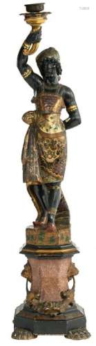 A probably Venetian polychrome painted and giltwood blackamoor torchère modeled holding a single candle-sconce aloft and dressed in an elaborately patterned costume, on an octagonal faux marble painted plinth set with gilt carving, H 230 cm - W 58 cm