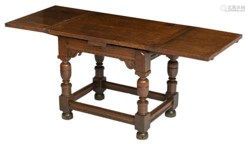 An oak Flemish table with an extendable top, the legs with large bulbous turnings, 17thC, H 86 - W 108 - 198 - D 77 cm