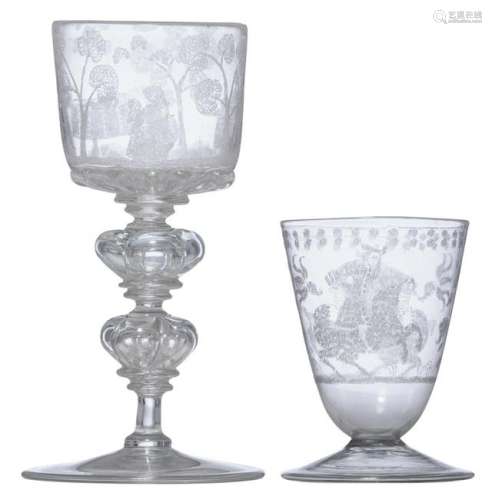 A 17th/18thC engraved glass wine goblet, decorated with two horsemen and flower baskets; added: a first half of the 18thC engraved glass wine goblet, decorated with pastoral scenes and a baroque worked foot, H 9,7 - 17,4 cm
