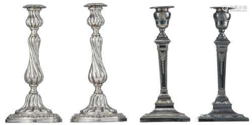 A pair of late 18thC Rococo revival silver candlesticks, Belgian hallmarks1868 - 1942, owners' monogram L.S., the bottom inside padded:; added: a pair of silver-plated neoclassical candlesticks; H 27 - 28 cm