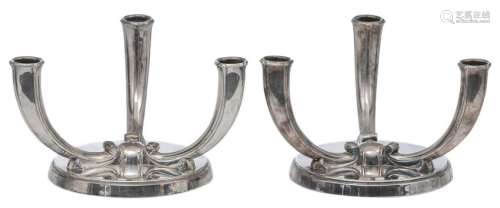 A pair of sterling silver Art Deco candlesticks, marked Wolfers Frères, H 13,5 cm, total weight silver about 2852g (included the weight to preserve stability)