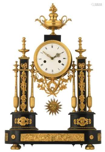 A neoclassical LXVI-period mantle clock, noir Belge marble and gilt brass mounts, (added: a certificate from the former seller), H 53,5 - W 34,5 - D 11 cm