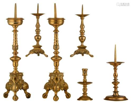 A set of a bronze pricket candlestick and a Heemskerck type candlestick, 17th/18thC, H 19 - 33 cm; added: two pairs of bronze pricket candlesticks, 17thC, H 33 - 58 cm