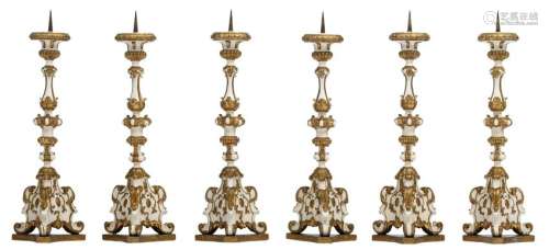 A series of six 18thC polychrome painted and gilt wooden baroque altar candlesticks, H 77 - 78 cm