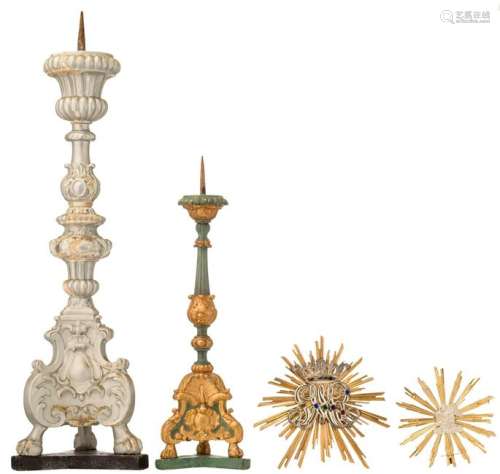 Two 18th/19thC gilt brass nimbuses mounted with silver Roman Catholic ornamental decoration, H 26 - 36 cm; added: two 18thC baroque polychrome painted/patinated altar candlesticks, H 80 - 118 cm