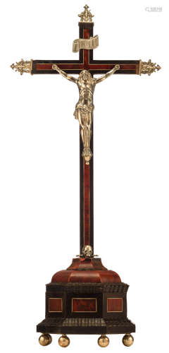 An 18thC silver corpus Christi on an ebonized wooden crucifix, ebony, tortoiseshell and ivory veneered and with silver mounts, no hallmarks found but tested on silver purity, one mount dated 1742, H 59 cmAdded expertise report according to CITES legislation. For European Community use only.