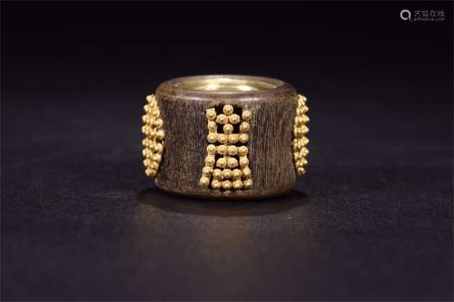 A Chinese Carved Agar-Wood Ring