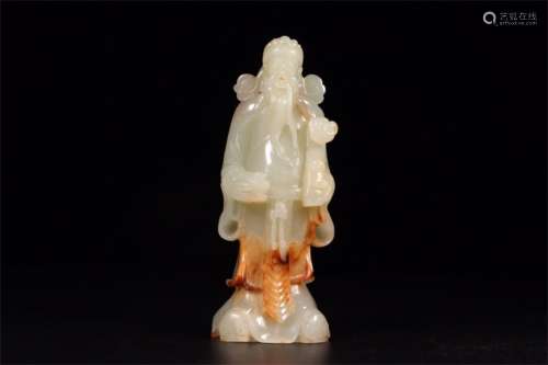 A Chinese Carved Jade Figure of Buddha