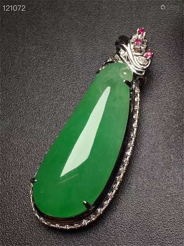 A Chinese Carved Jadeite Pendant