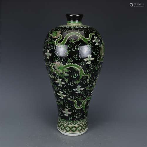 A Chinese Black Ground San-Cai Glazed Porcelain Vase