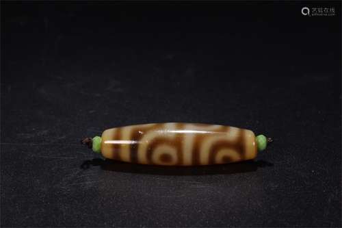 A Chinese Carved Agate DZI Bead