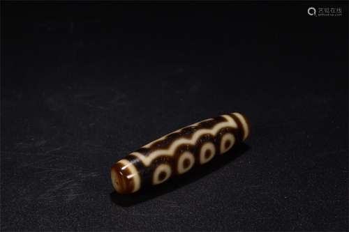 A Chinese Carved Agate DZI Bead