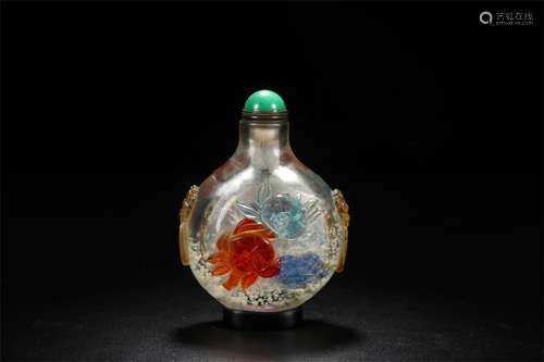 A Chinese Carved Peking Glass Snuff Bottle