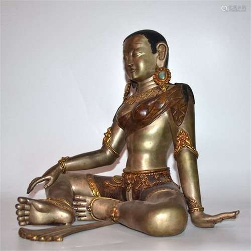 A Chinese Gilt Silver Figure of Buddha