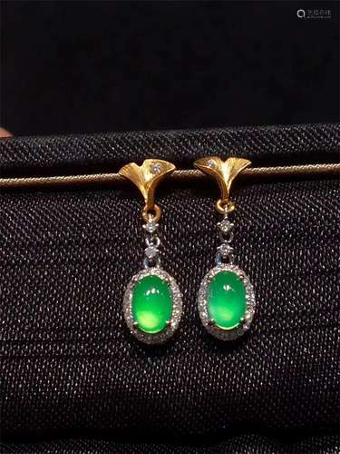 A Pair of Chinese Carved Jadeite Earrings