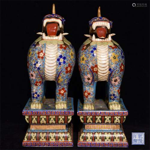 A Pair of Chinese Enamel Glazed Foo-Dogs