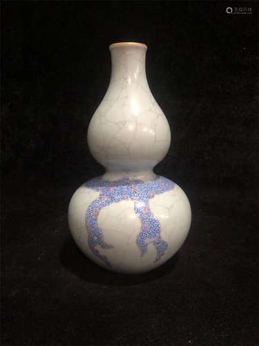 A Chinese Famille-Rose Porcelain Double Gourd Vase