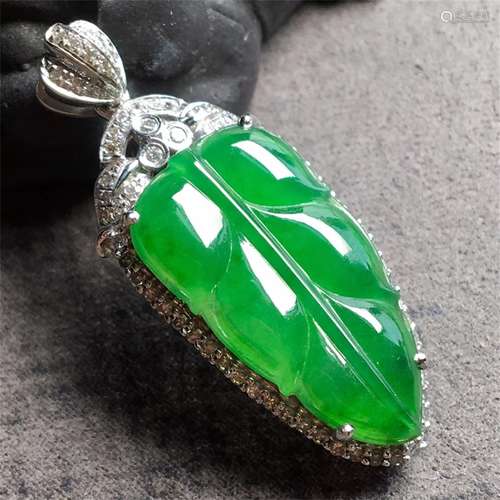 A Chinese Carved Jadeite Pendant