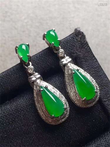 A Pair of Chinese Carved Jadeite Earrings