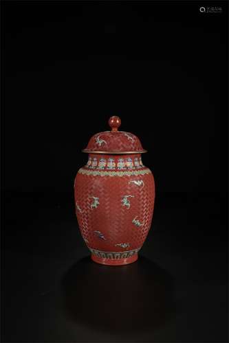 A Chinese Red Ground Famille-Rose Porcelain Jar with Cover