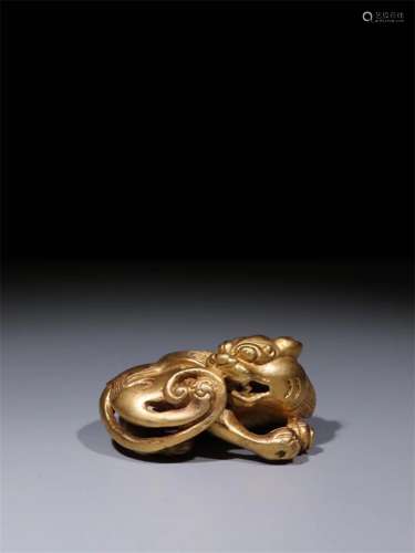 A Chinese Gilt Bronze Foo-Dog