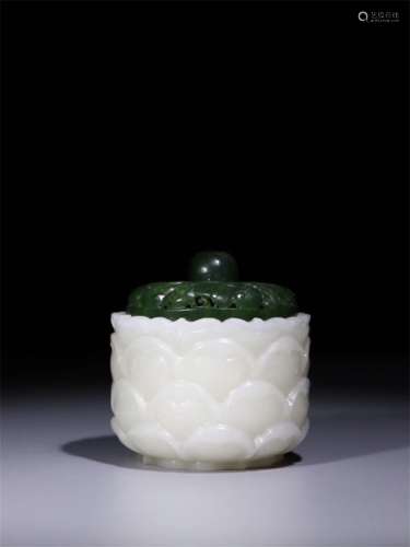 A Chinese Carved Jade Ring with Case