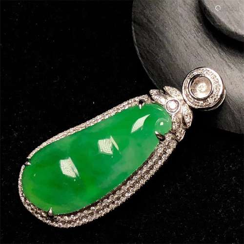 A Chinese Carved Jadeite Pendant