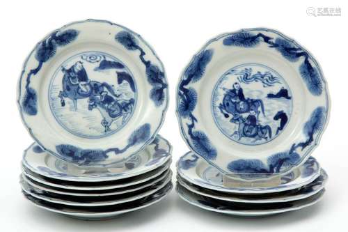 Ten small sized, blue and white plates with figure…