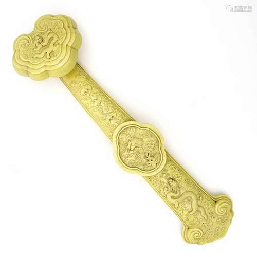 A yellow glazed porcelain ruyi sceptre Second half…