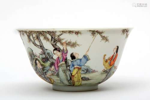 A fencai bowl decorated with ladies in a garden pi…