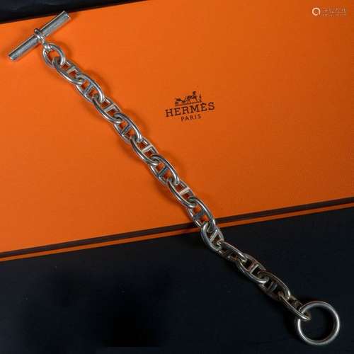 Bracelet de marque Hermès en argent. Modèle \