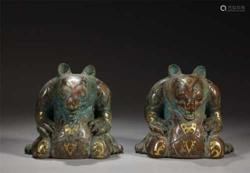 A Pair of Bear Paperweights with Inlaid Gold and Silver