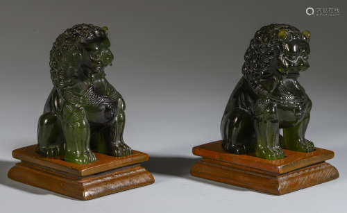 PAIR OF CHINESE GREEN ROCK CRYSTAL LIONS TABLE ITEMS