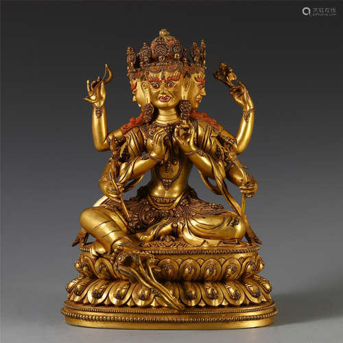 CHINESE GILT BRONZE SEATED SIX ARM GUANYIN