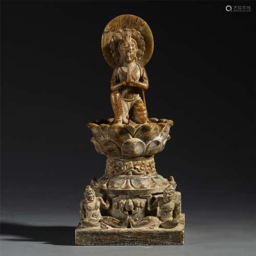 CHINESE LEOPARD'S SPOT JADE SEATED GUANYIN ON LOTUS STAND SUI DYNASTY PROVENANCE: FROM THE COLLECTION OF CHRISTINE LATTY (1899-1981)