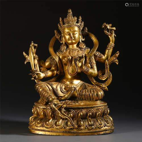 TIBETAN GILT BRONZE SEATED FOUR ARM GUANYIN