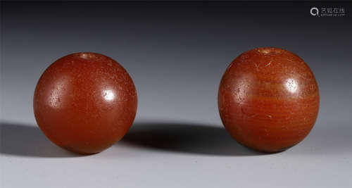 TWO CHINESE RED AGATE BEAD TANG DYNASTY